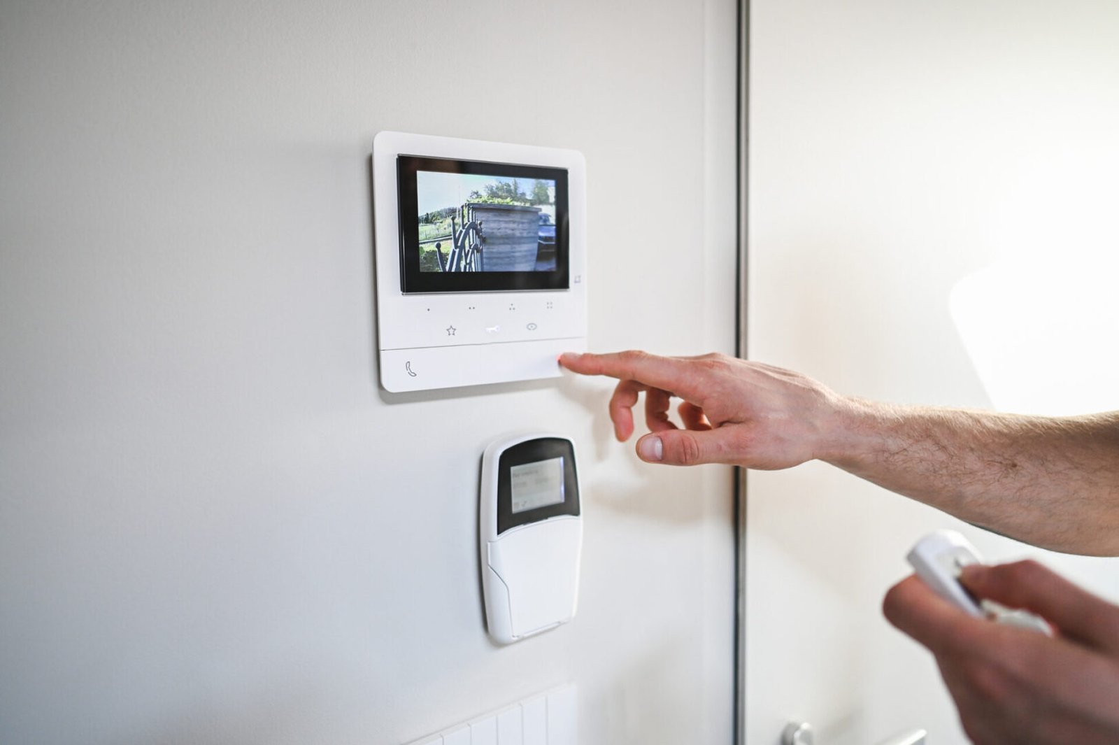 Touchscreen security monitor on wall