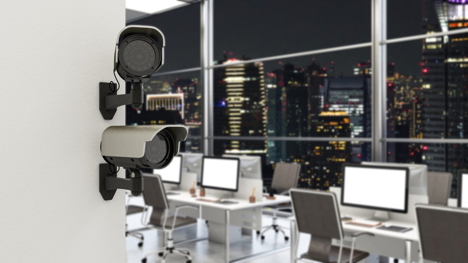 Security cameras overlooking modern office space.